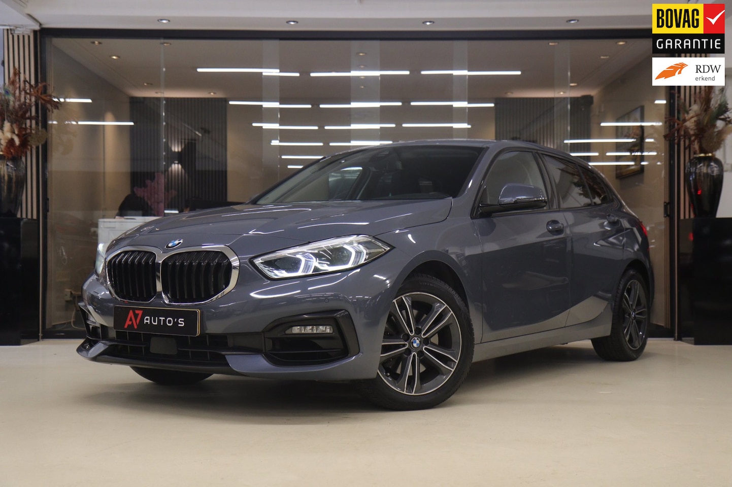 BMW 1-serie - 118i Executive Edition NAP/CARPLAY/CAM/LANEASSIST/NAVI/VOL - AutoWereld.nl