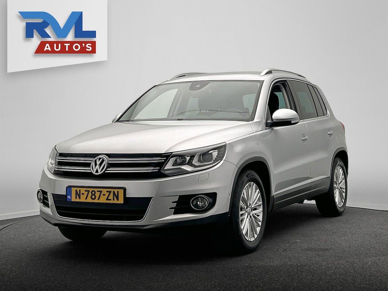 Volkswagen Tiguan - 1.4 TSI Automaat Trekhaak Navigatie Camera Climate-control Cruise - AutoWereld.nl