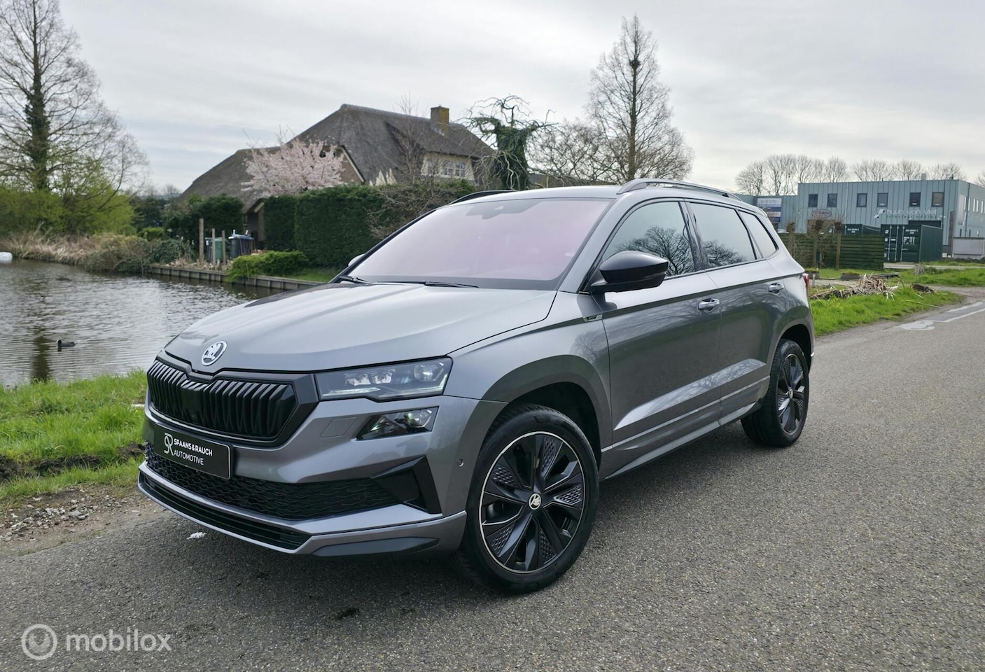 Skoda Karoq - 1.5 TSI ACT Sportline / 360' Cam / Navi / Luxe - AutoWereld.nl