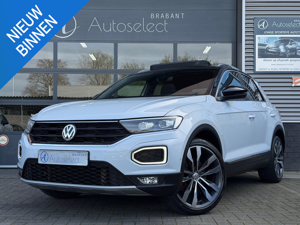 Volkswagen T-Roc - 2.0 TSI 4Motion Sport Pano CarPlay Beats - AutoWereld.nl