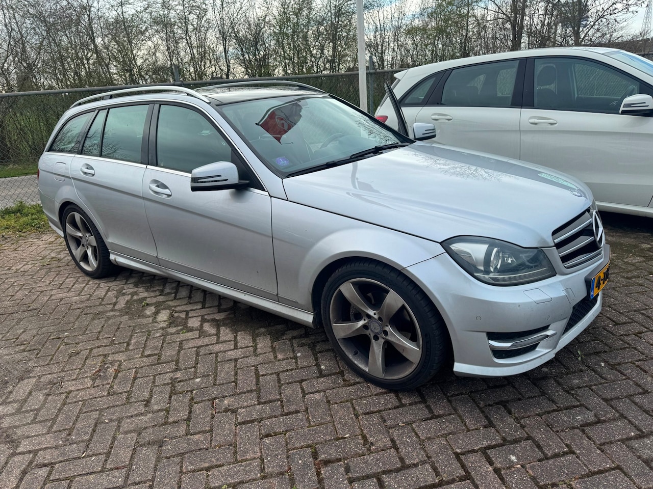 Mercedes-Benz C-klasse Estate - 200 Ambition Avantgarde AMG Styling Pano - AutoWereld.nl