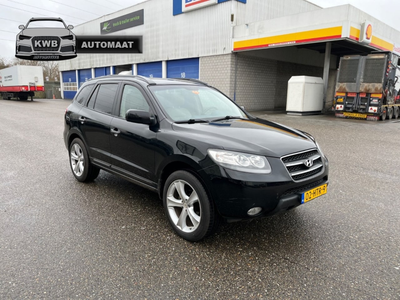 Hyundai Santa Fe - 2.7i V6 4WD Leer 7pers Schuifkanteldak - AutoWereld.nl