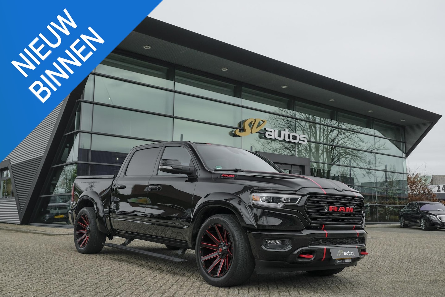 Dodge Ram 1500 - 5.7 V8 401pk 4x4 Limited LPG G3 Widebody Black&Red Luchtvering Trekhaak Head-up Harman/kar - AutoWereld.nl