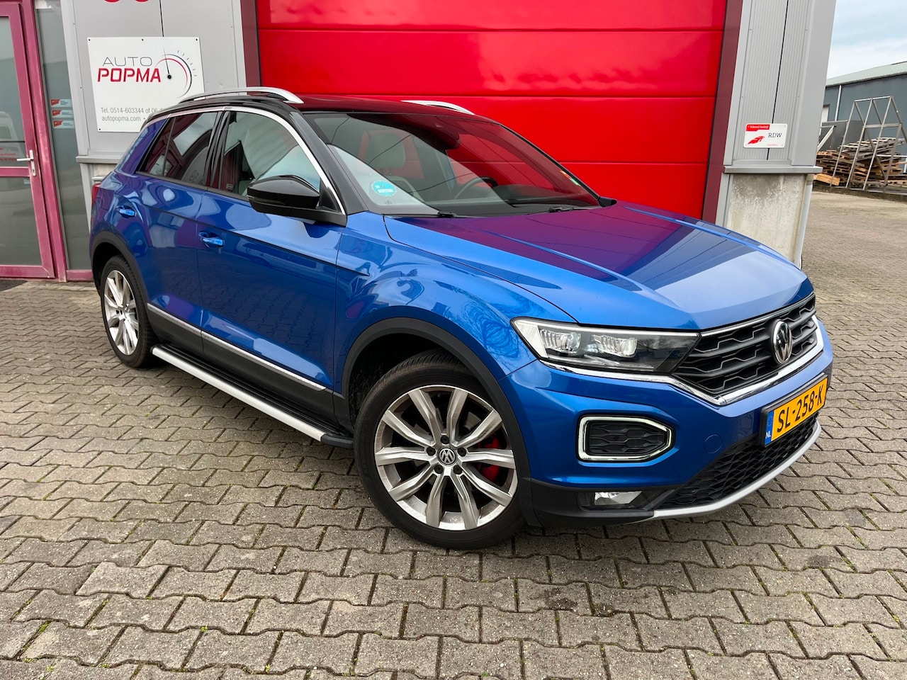 Volkswagen T-Roc - 2.0 TSI 190pk 4Motion Sport Automaat / Open dak / Trekhaak / Leder / Virtual cockpit / Sto - AutoWereld.nl