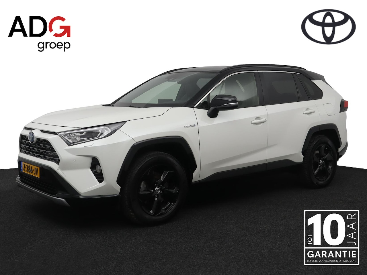 Toyota RAV4 - 2.5 Hybrid AWD Bi-Tone | Leder | Stoel en stuurverwarming | Trekhaak | 1650 kg trekgewicht - AutoWereld.nl