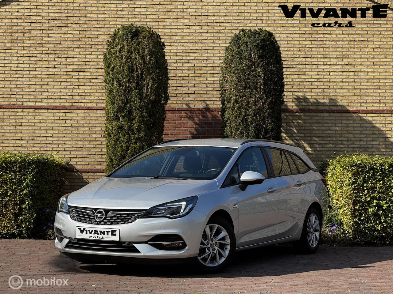 Opel Astra Sports Tourer - 1.4 Business Edition AUT.*Camera*Cruise - AutoWereld.nl