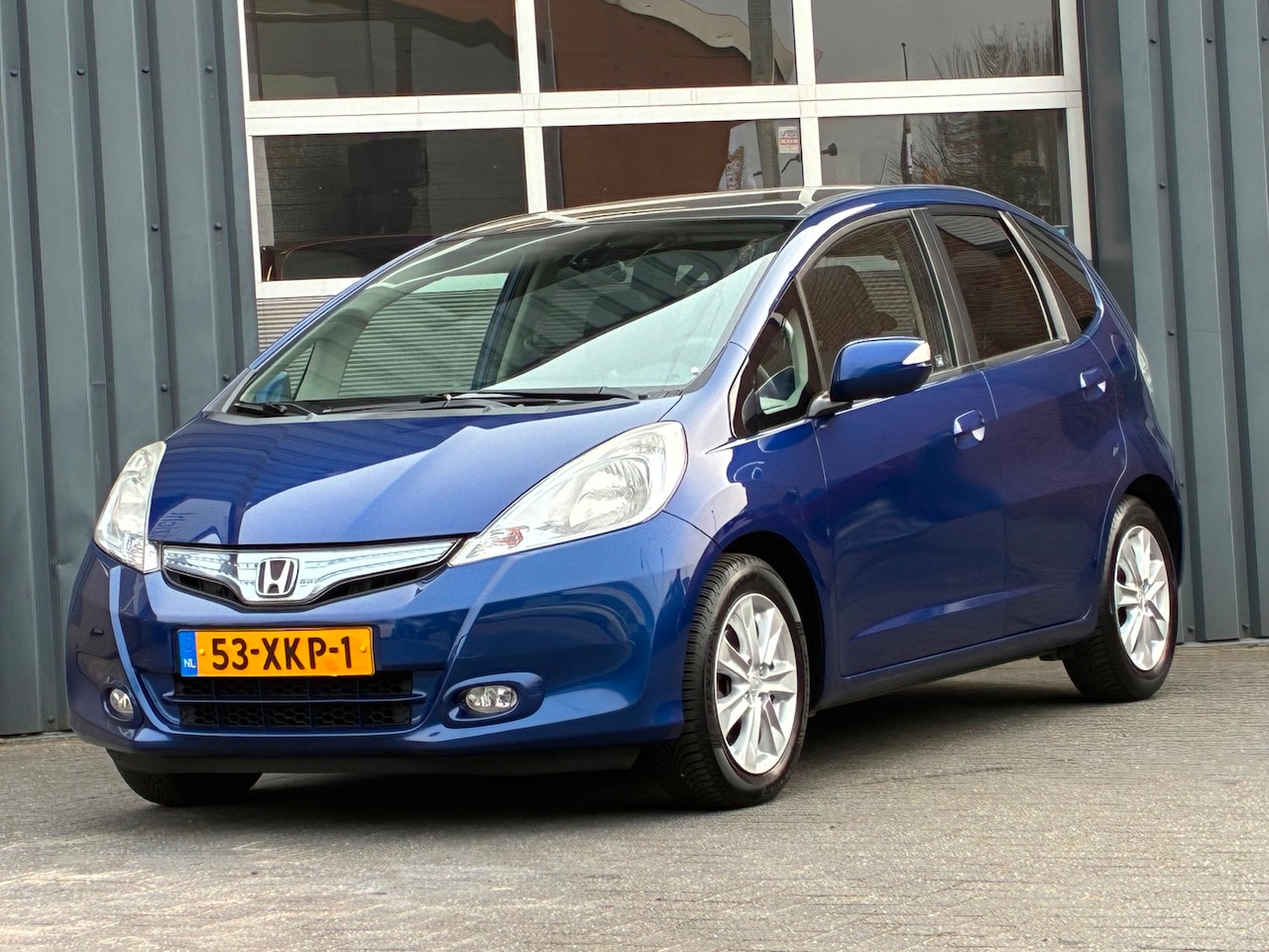 Honda Jazz - 1.4 Hybrid Exclusive Leder Climatecontrole Panodak - AutoWereld.nl
