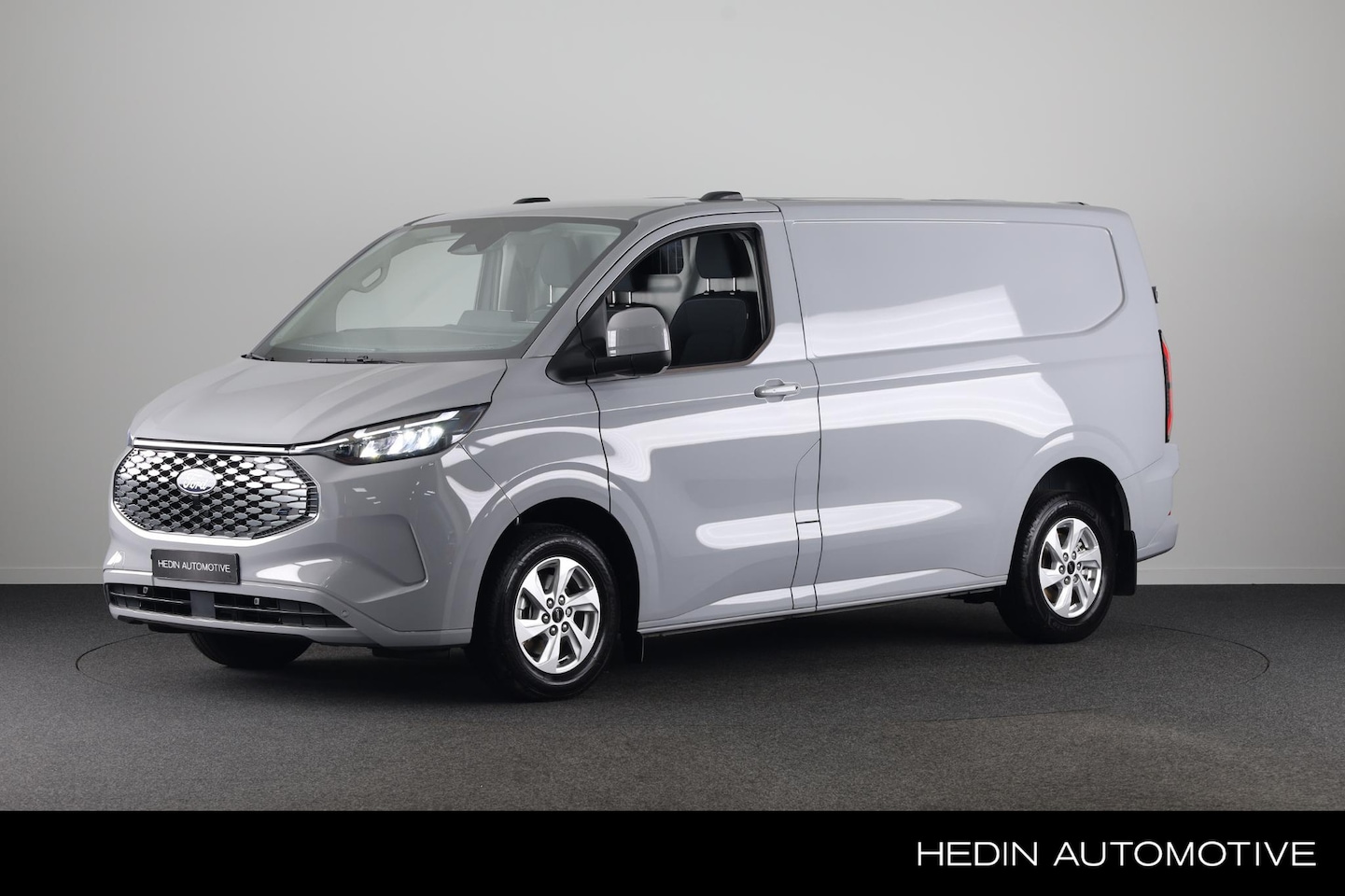 Ford Transit Custom - E-Transit 320 L1H1 Limited 65 kWh | Trekhhaak | Power on board | Bliss | Winterpakket | Le - AutoWereld.nl