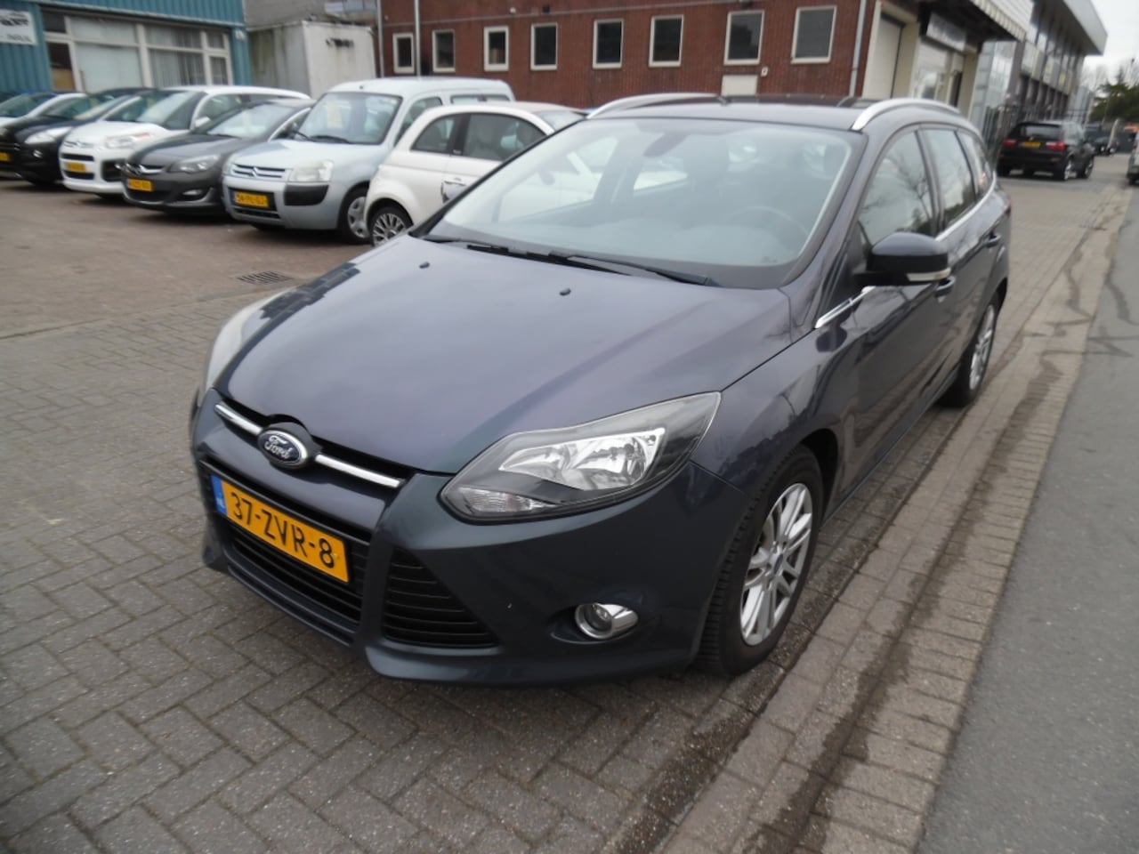Ford Focus Wagon - airco 1.0 EcoB. Titanium lees text - AutoWereld.nl