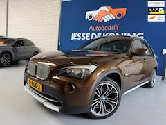 BMW X1 - SDrive18i Executive / bj.2010 / kleur: bruin / navigatie / climate / cruise / airco / NAP