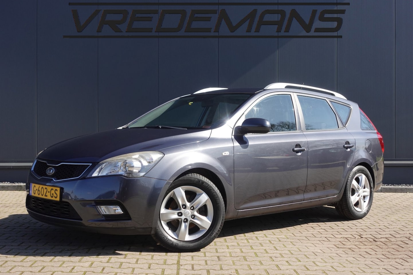 Kia Cee'd Sporty Wagon - 1.4 CVVT X-ecutive 1.4 CVVT X-ecutive - AutoWereld.nl