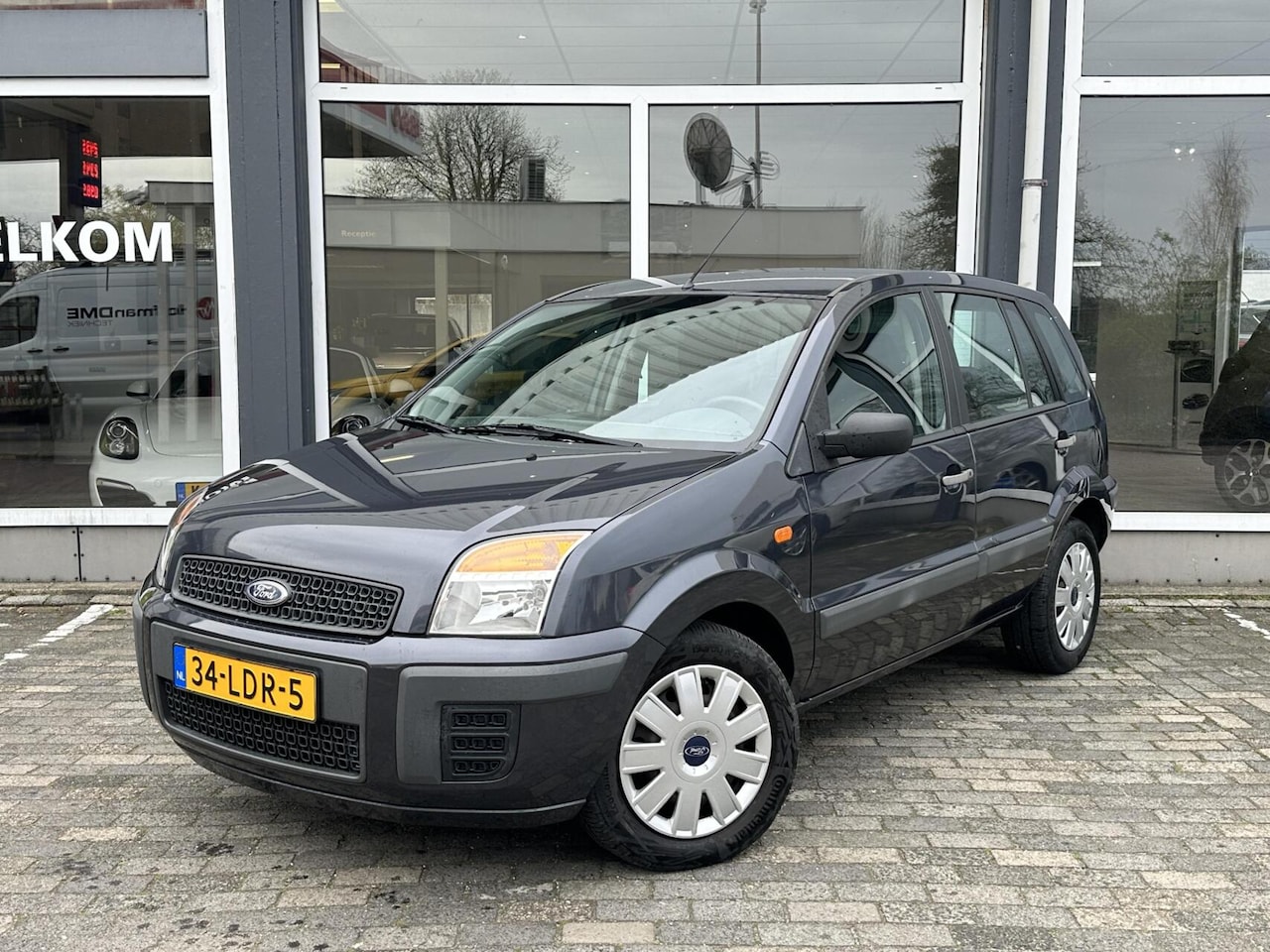 Ford Fusion - 1.4-16V Cool & Sound|Airco|1e eigenaar|Dealer o. - AutoWereld.nl