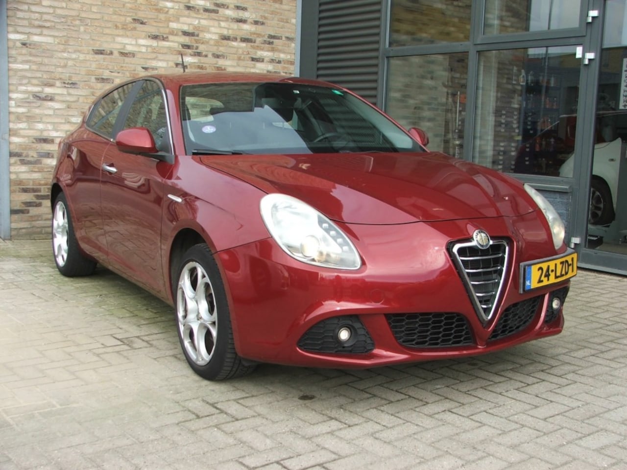 Alfa Romeo Giulietta - 1.4 16V Turbo 88KW Distinctive Alfa Romeo Rosso - AutoWereld.nl