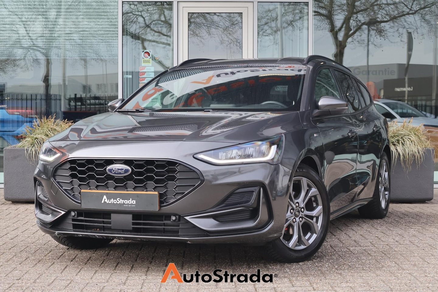 Ford Focus Wagon - 1.0 ST-Line 125pk | Stoelverwarming | Winter Pakket | Trekhaak | LED | Carplay | Navi | Cr - AutoWereld.nl