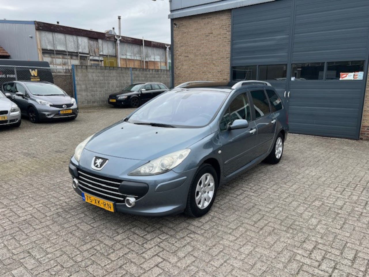 Peugeot 307 SW - 1.6-16V Premium + 6 de stoel. - AutoWereld.nl