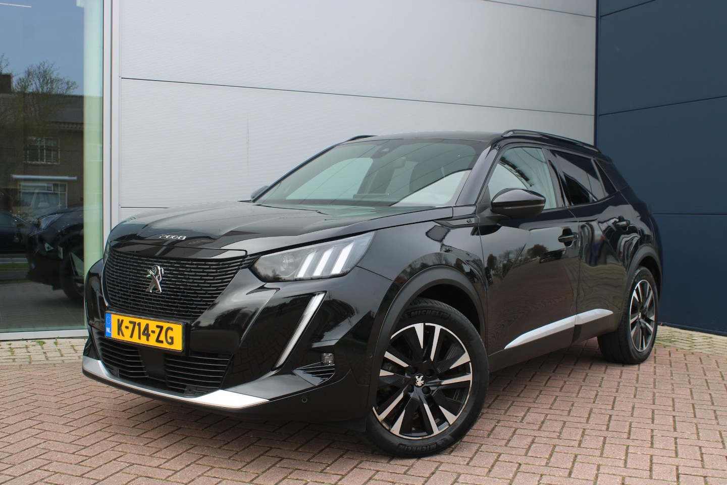 Peugeot e-2008 - EV GT Pack 50 kWh Airco Navi Adaptive Cruise Verwarmde voorstoelen Carplay Dealer onderhou - AutoWereld.nl