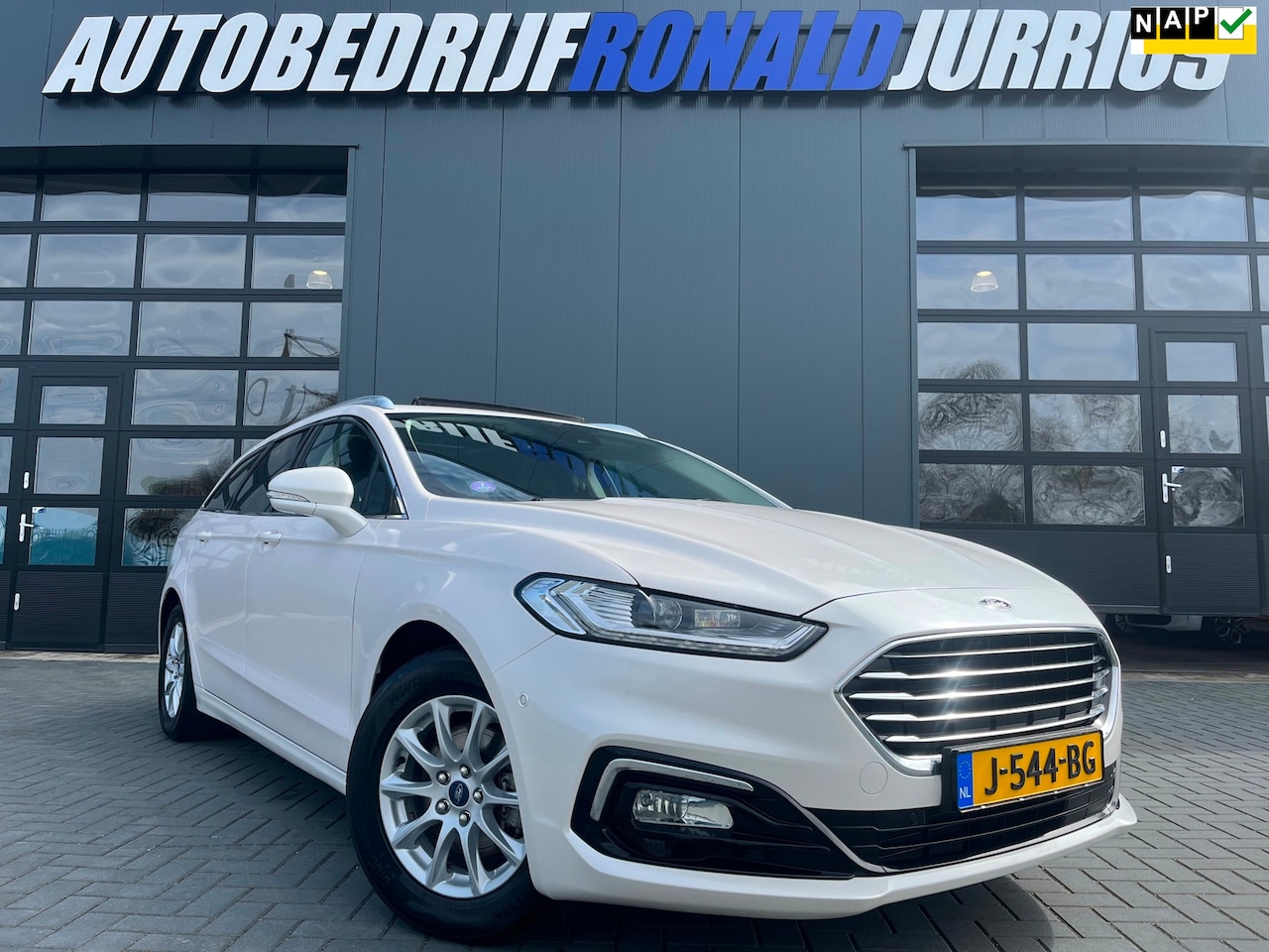 Ford Mondeo Wagon - 2.0 IVCT HEV Titanium NL.Auto/Panoramadak/Lage.Km/Camera/Keyless/Elc.Kofferklep/1Ste Eigen - AutoWereld.nl