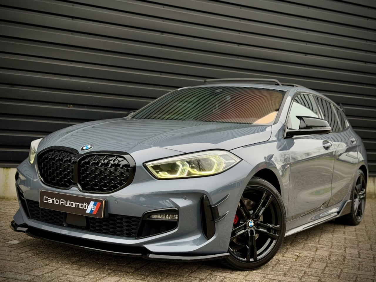 BMW 1-serie - 118i M-PERF. M135 PANO|SCHAALSTOEL|H/K|HUD VOL! - AutoWereld.nl