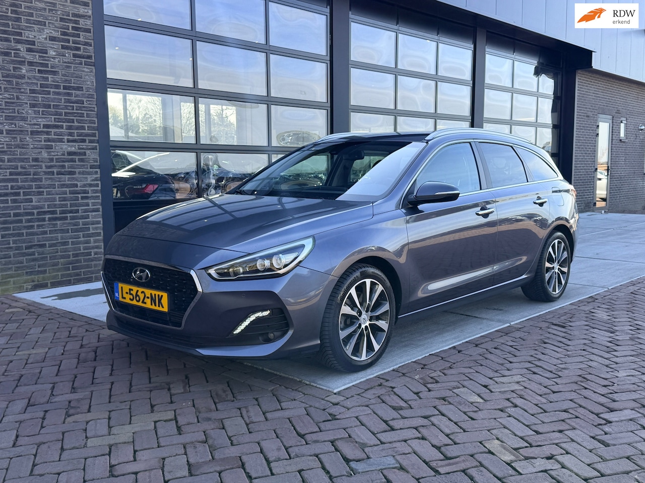Hyundai i30 Wagon - 1.4 T-GDI Premium | Autom | Leer | Navi | VOL! | - AutoWereld.nl