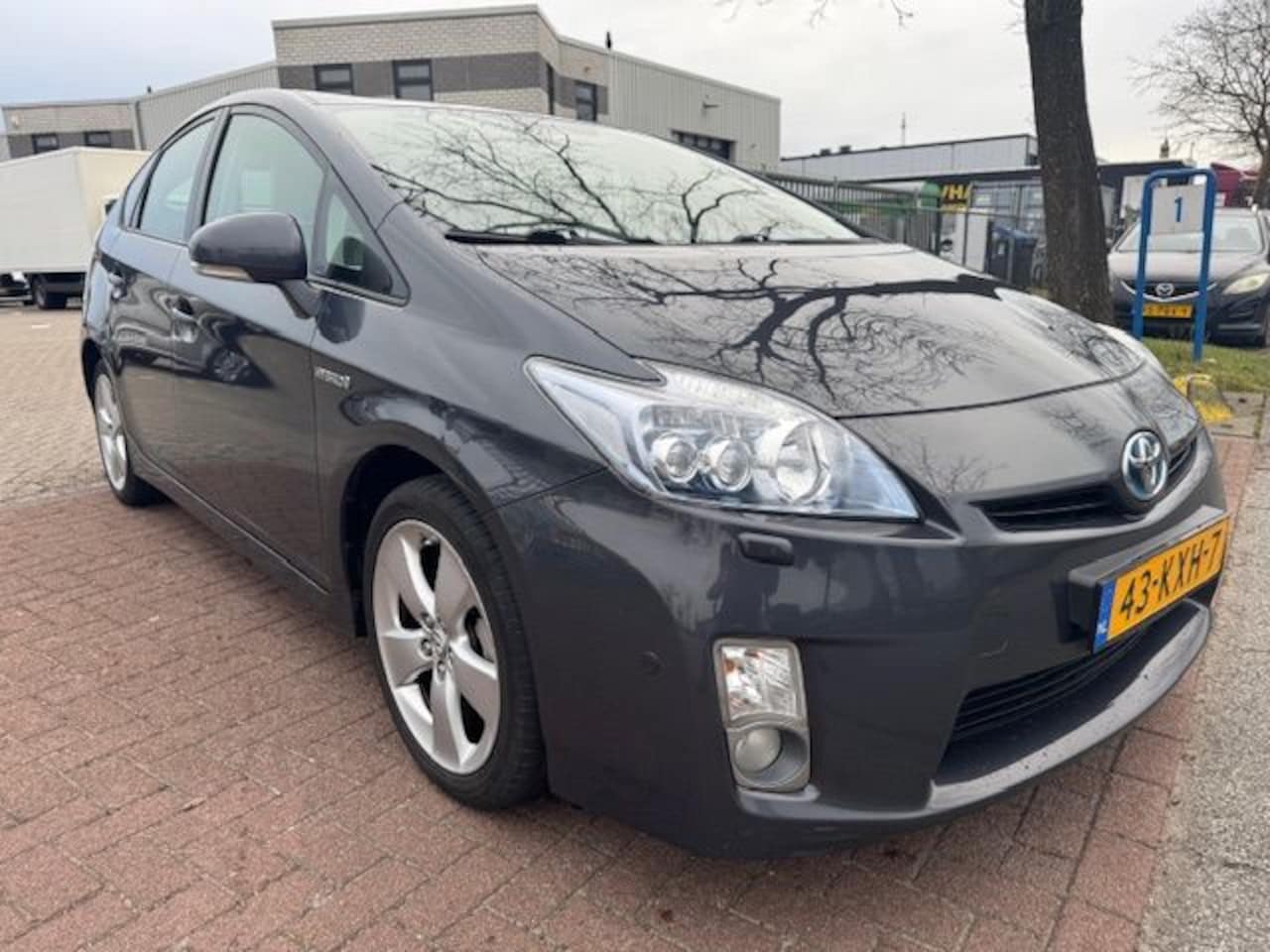 Toyota Prius - 1.8 Dynamic Airco/ECC,Navigatie,HUD,Camera - AutoWereld.nl