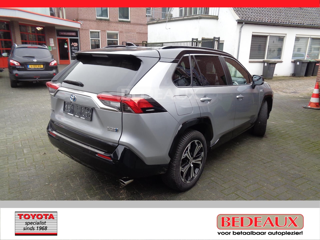 Toyota RAV4 - 2.5 Plug-in Hybrid 306pk CVT AWD Bi-Tone Plus bij Toyota specialist - AutoWereld.nl