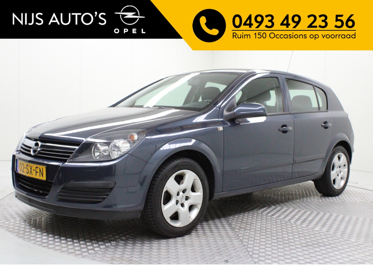 Opel Astra - 1.6 Edition | trekhaak | airco | cruise control | electr. verstelbare spiegels | centrale - AutoWereld.nl