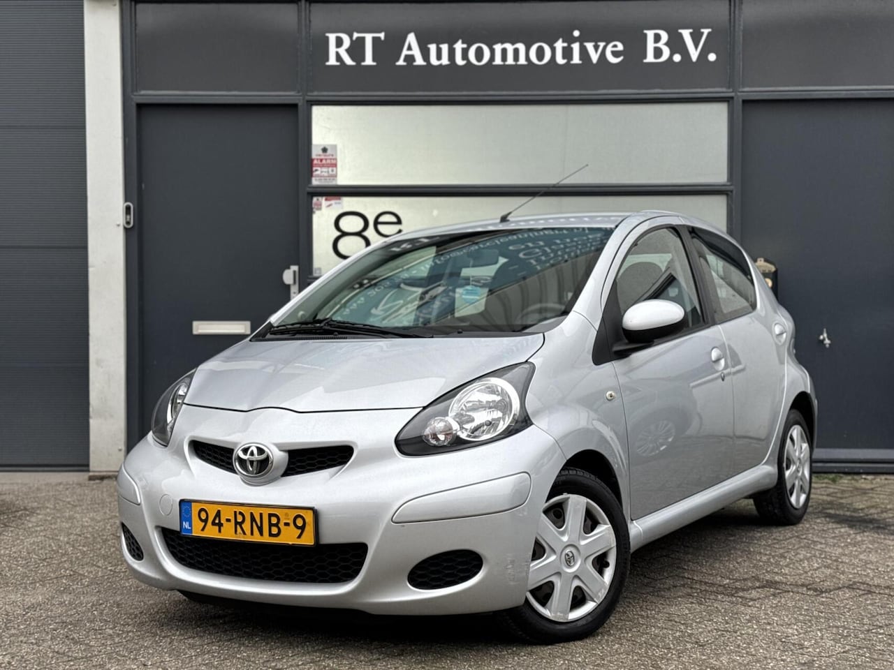 Toyota Aygo - 1.0-12V Dynamic Navigator Dealer OH Airco 5Drs - AutoWereld.nl