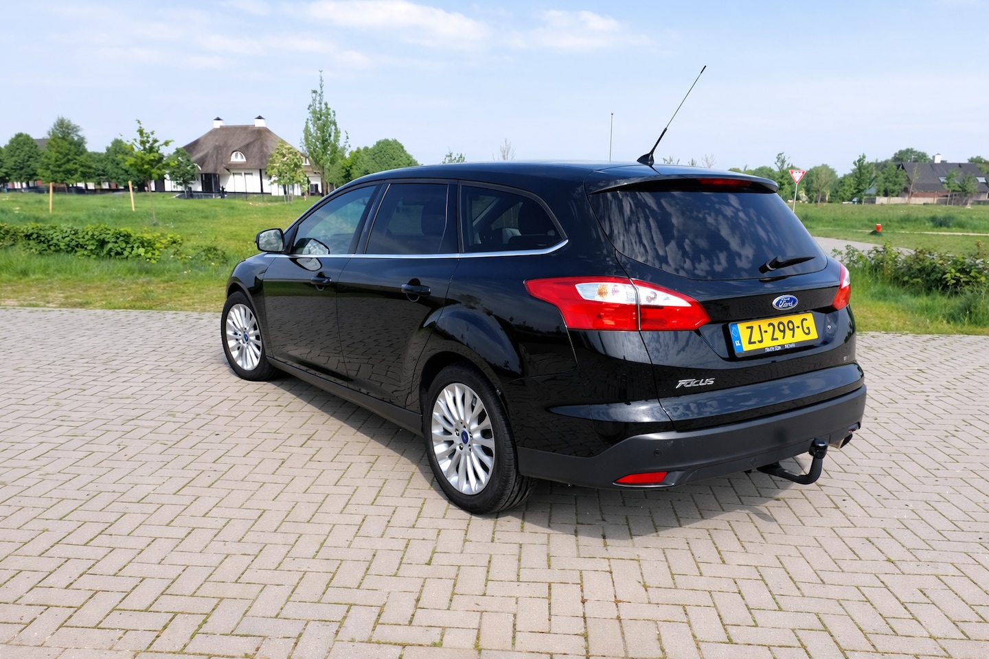 Ford Focus Wagon - 1.6 EcoBoost Lease Titanium - AutoWereld.nl