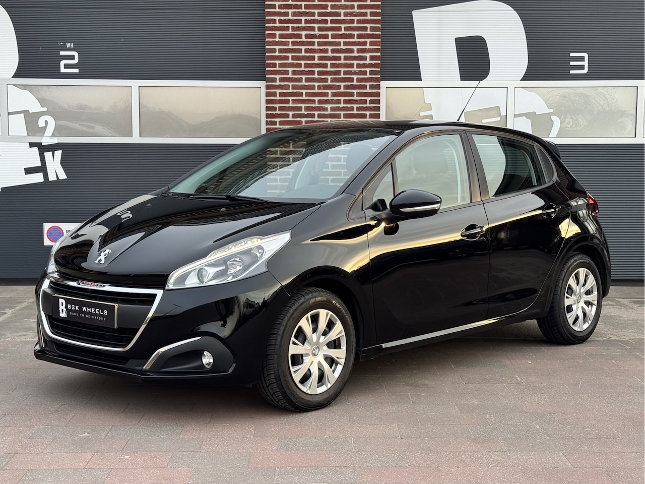 Peugeot 208 - 1.2 PureTech Blue Lion | NAP | Nieuwe riem! | 1e eigenaar | Cruise | Allseason | PDC | Rij - AutoWereld.nl