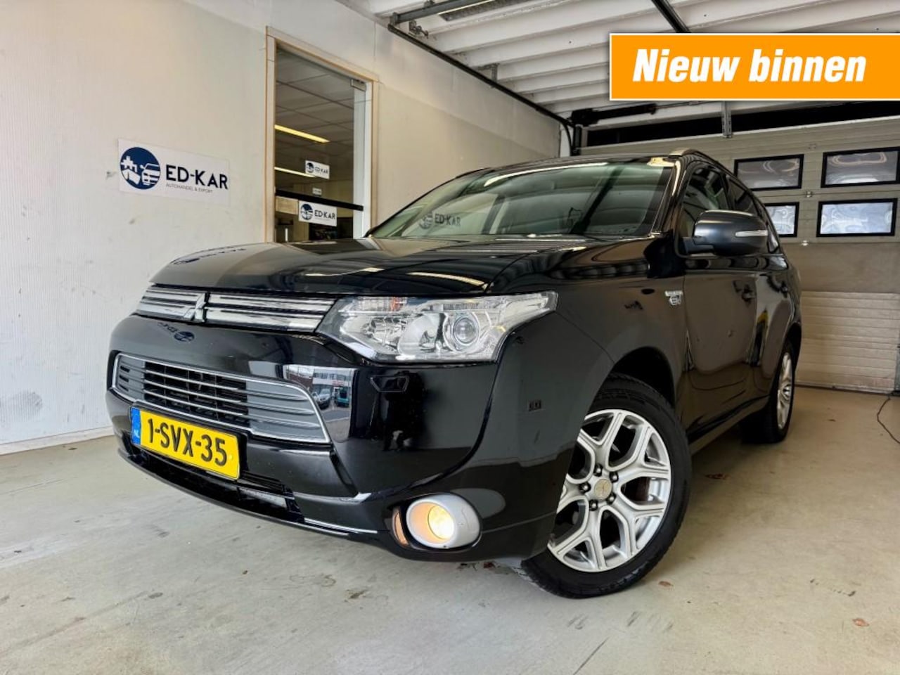 Mitsubishi Outlander - 2.0 PHEV instyle 2DE EIG LEER DAK CAMERA NAVI NAP APK - AutoWereld.nl