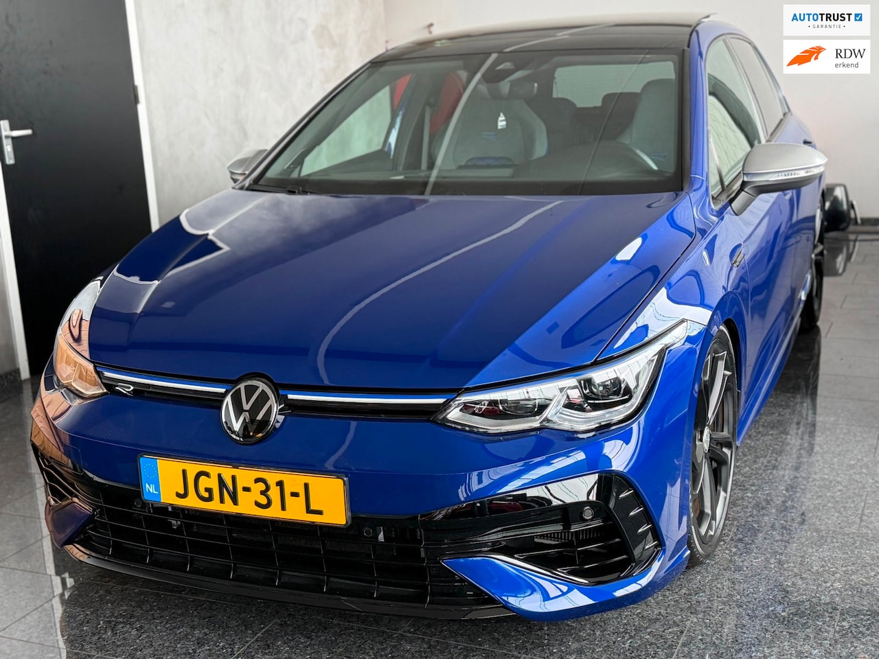 Volkswagen Golf - 2.0 TSI R 4Motion 333PK 2023 Blauw Bilstein /APR Pano - AutoWereld.nl
