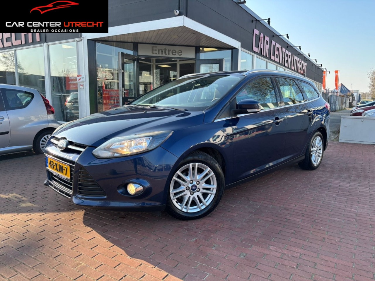 Ford Focus Wagon - 1.0 EcoBoost Titanium 6versn airco navi nette auto - AutoWereld.nl