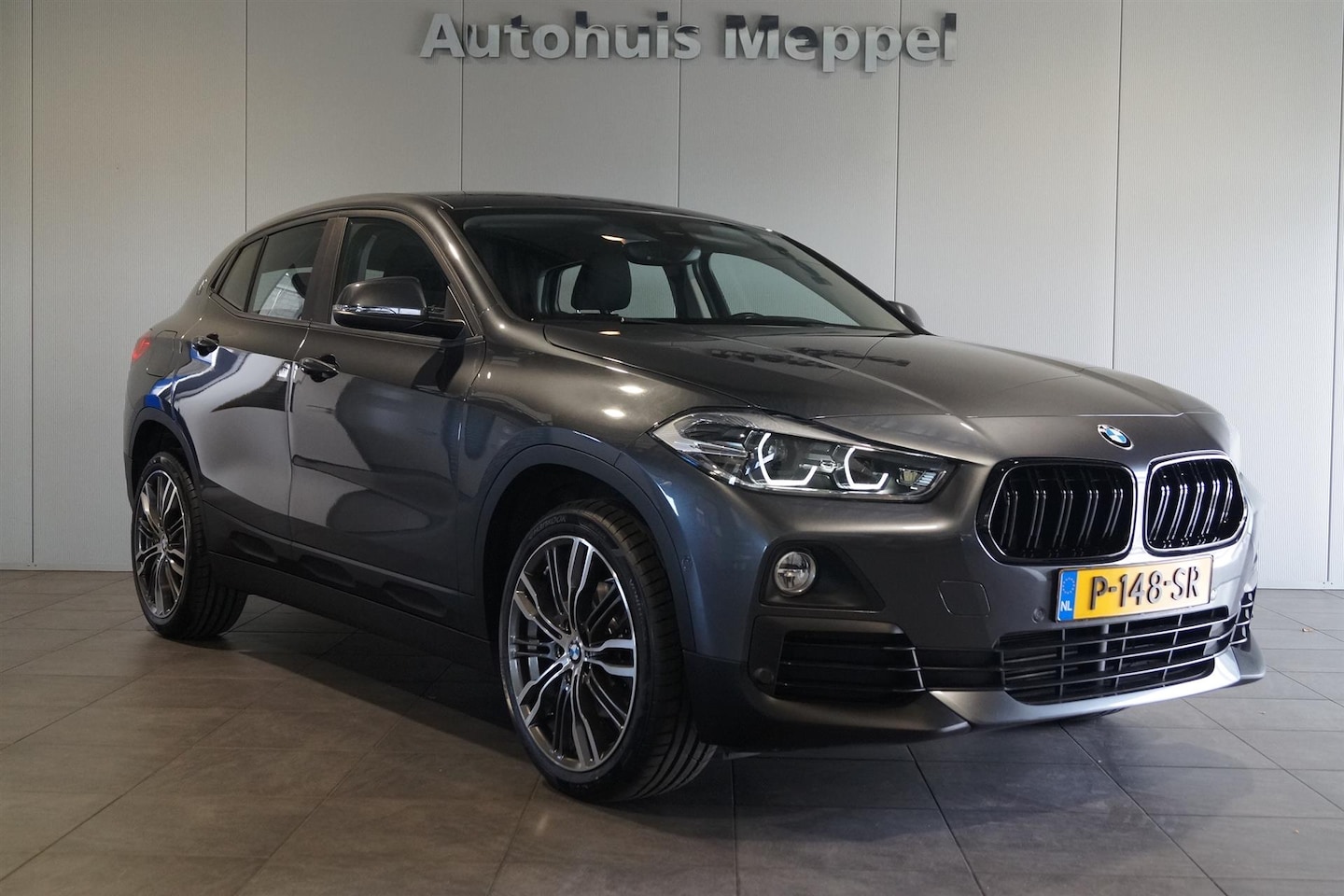 BMW X2 - sDrive18i SportStoelen | PDC | LED | Navigatie | Cruise Control - AutoWereld.nl