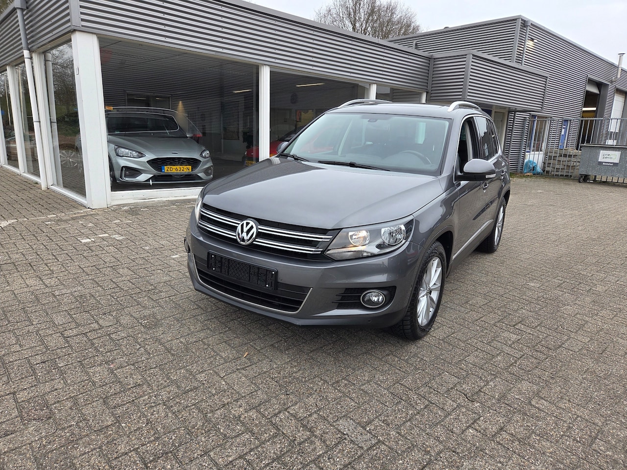 Volkswagen Tiguan - 1.4 TSI Sport&Style - AutoWereld.nl