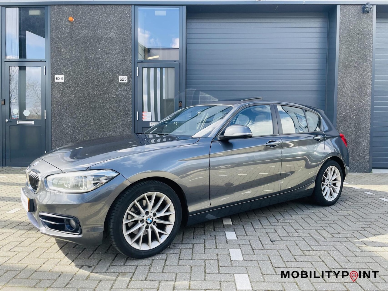 BMW 1-serie - 120i Sport | Xenon | Navi |Schuifdak | Aut | 177Pk - AutoWereld.nl
