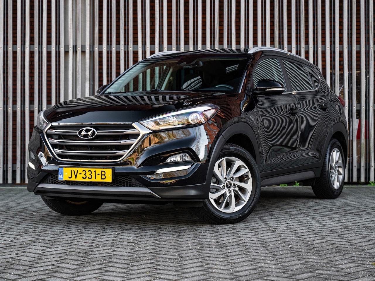 Hyundai Tucson - 1.6 GDi 132pk Comfort |NL-AUTO|Navi|Camera|ClimateControl|Stoelverwarming|CruiseControl|PD - AutoWereld.nl
