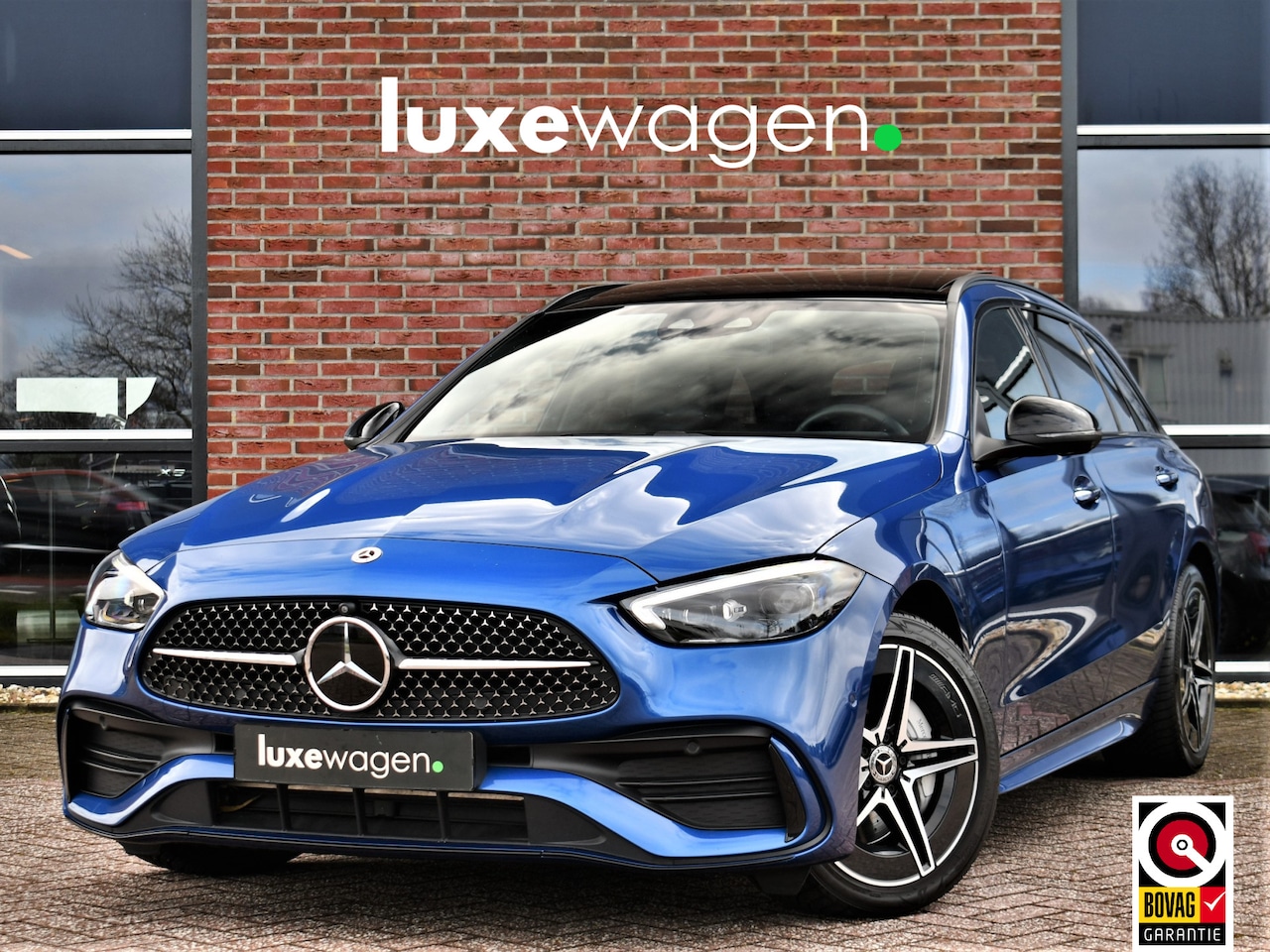 Mercedes-Benz C-klasse Estate - 300 e AMG Line Pano - AutoWereld.nl