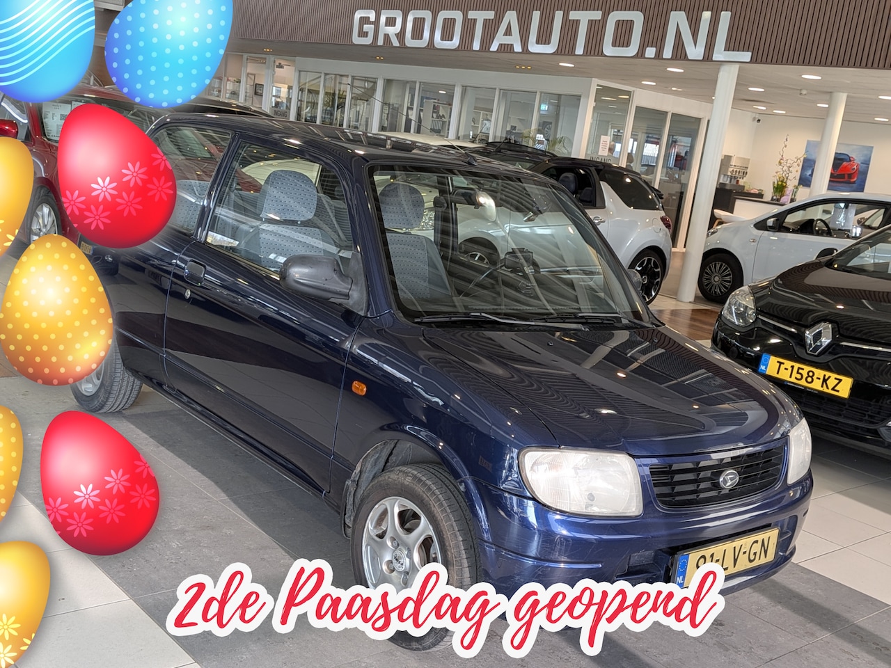 Daihatsu Cuore - 1.0-12V DVVT STi Automaat NAP 65.196km - AutoWereld.nl