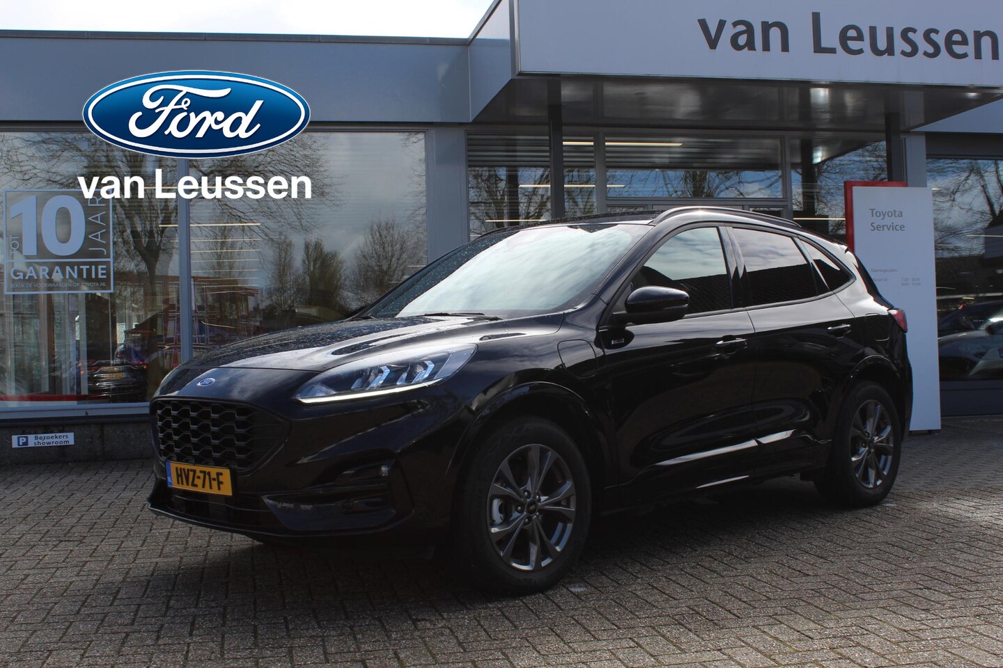 Ford Kuga - 2.5 PHEV ST-LINE STOEL-STUUR & VOORRUIT VERW APPLE/ANDROID NAVI PARK-SENSOREN KEYLESS CRUI - AutoWereld.nl