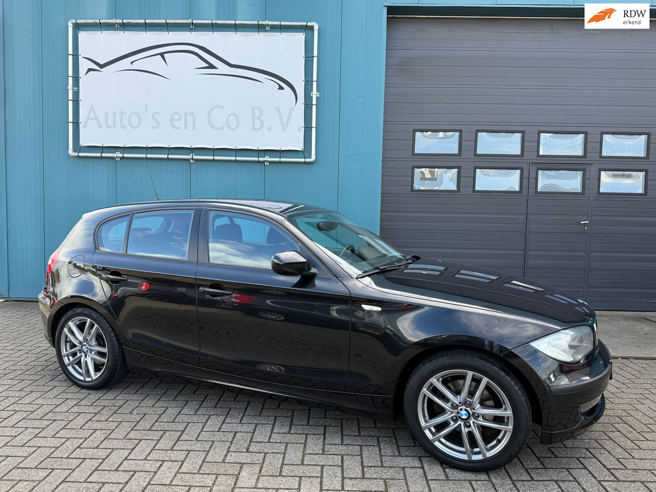 BMW 1-serie - 118i Business Line 5-deurs Clima Cruise 17"Lm velgen Zeer nette staat. - AutoWereld.nl