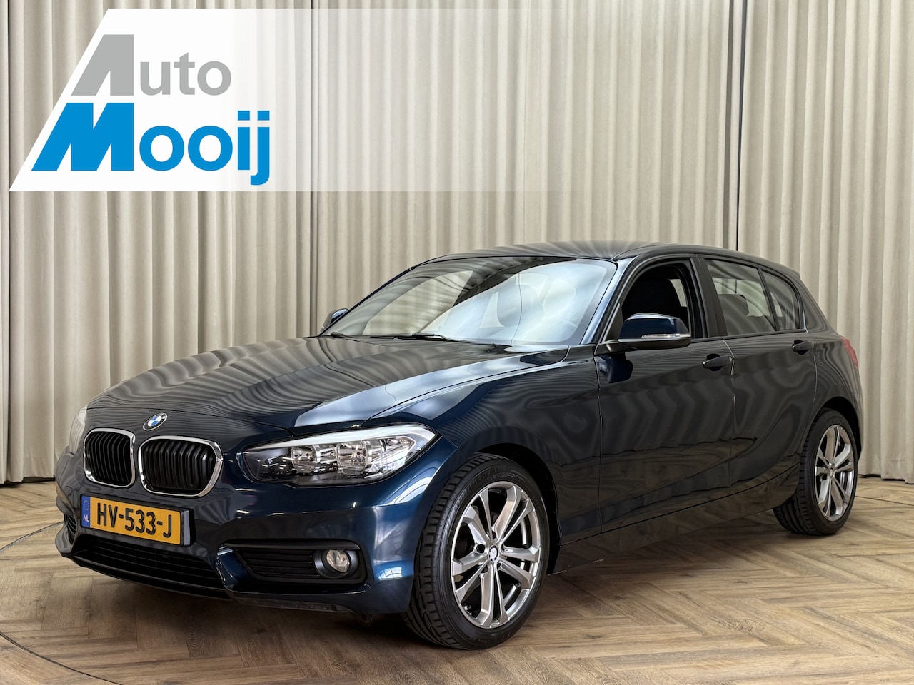 BMW 1-serie - 118i Facelift / Org.NL! / Trekhaak / Navigatie / Cruise / PDC / 17'' LMV - AutoWereld.nl