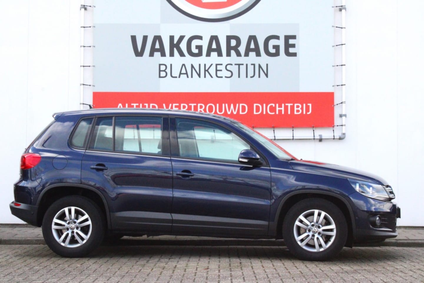 Volkswagen Tiguan - 1.4 TSI Sport&Style - AutoWereld.nl