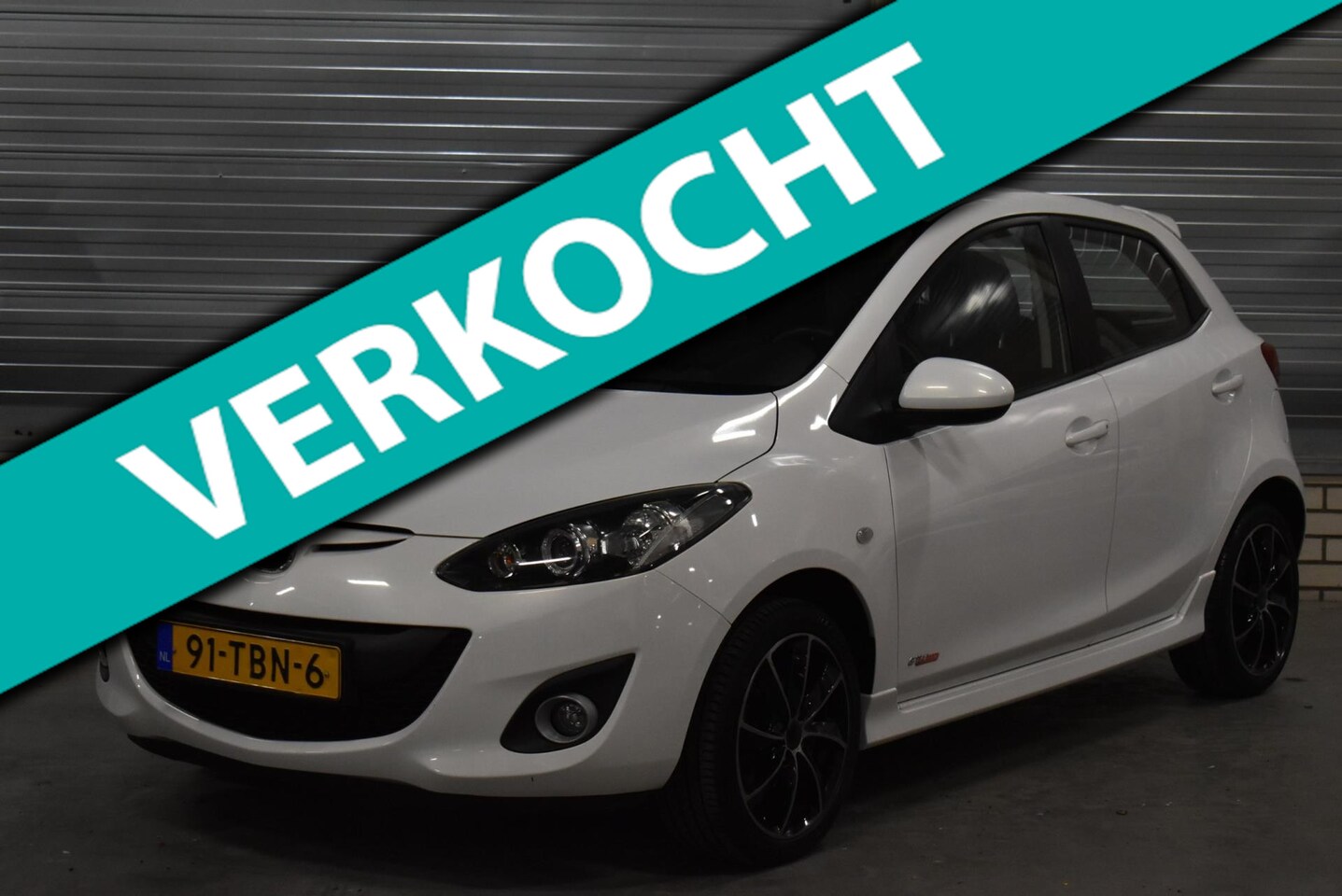 Mazda 2 - 1.3 GT-M Line 82.000KM!!! Parelmoer Wit + Airco|Stoelverwarming| - AutoWereld.nl