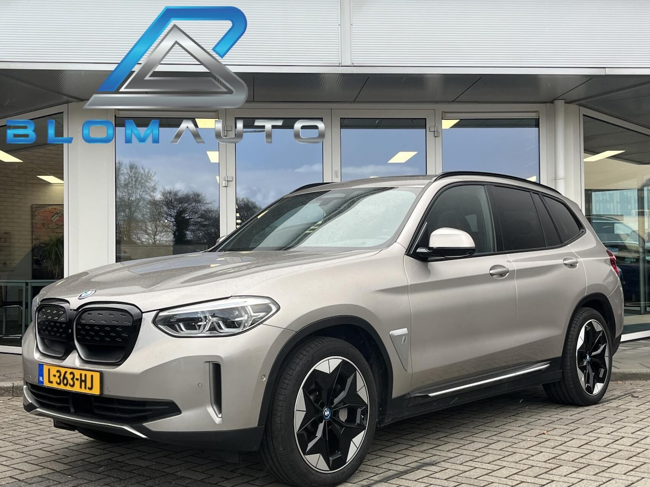 BMW iX3 - High Executive 80 kWh PANO+KEYLESS+MEMORY+ACC+LEER - AutoWereld.nl