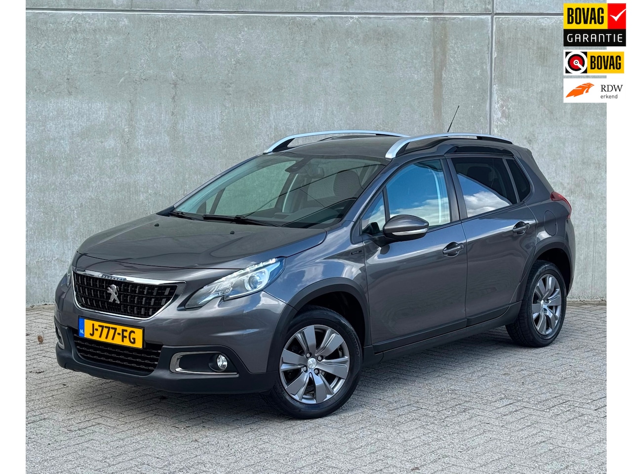 Peugeot 2008 - 1.2 82pk 2019 Grijs CLIMA|TREKHAAK|NAP|CARPLAY - AutoWereld.nl