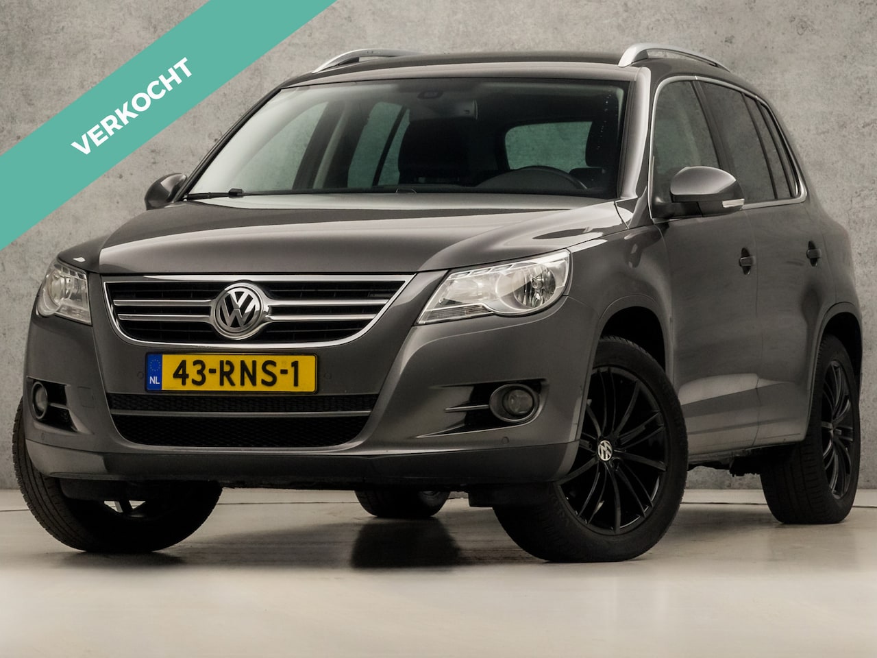 Volkswagen Tiguan - 1.4 TSI Sport&Style 150Pk (NAVIGATIE, CLIMATE, GETINT GLAS, TREKHAAK, SPORTSTOELEN, CRUISE - AutoWereld.nl
