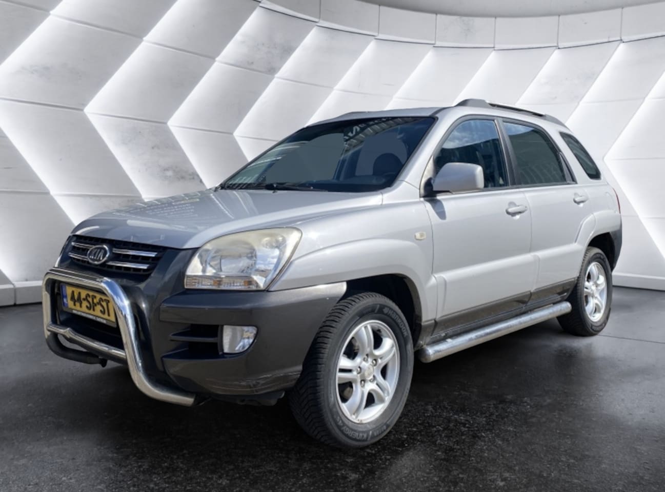 Kia Sportage - 2.0 CVVT Executive 2.0 CVVT Executive - AutoWereld.nl