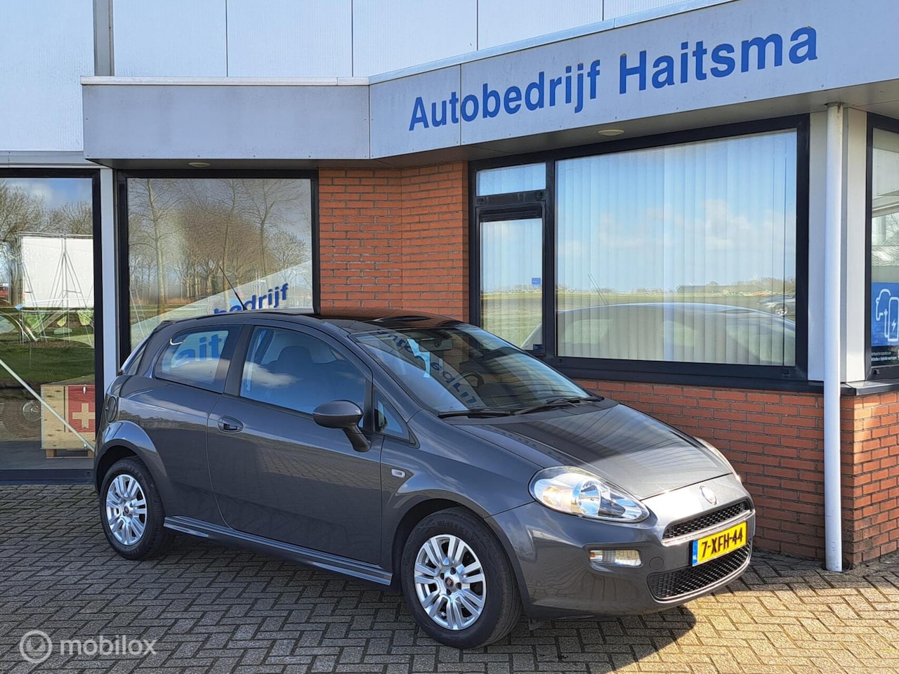 Fiat Punto Evo - 0.9 TwinAir Street Airco | Open dak | LMV - AutoWereld.nl