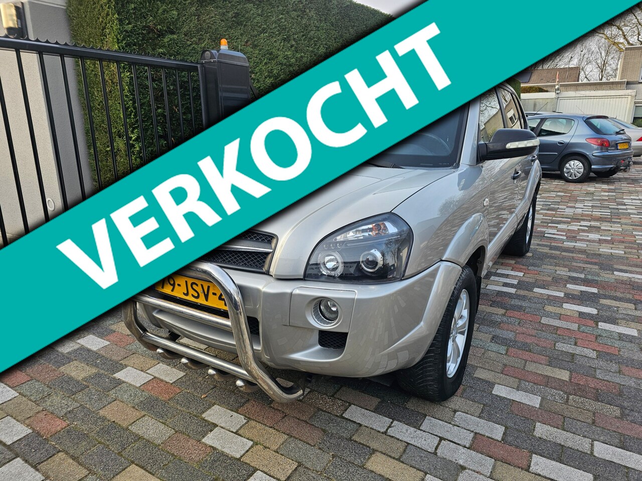 Hyundai Tucson - 2.0i Dynamic Executive 2009 Airco Trekh. - AutoWereld.nl