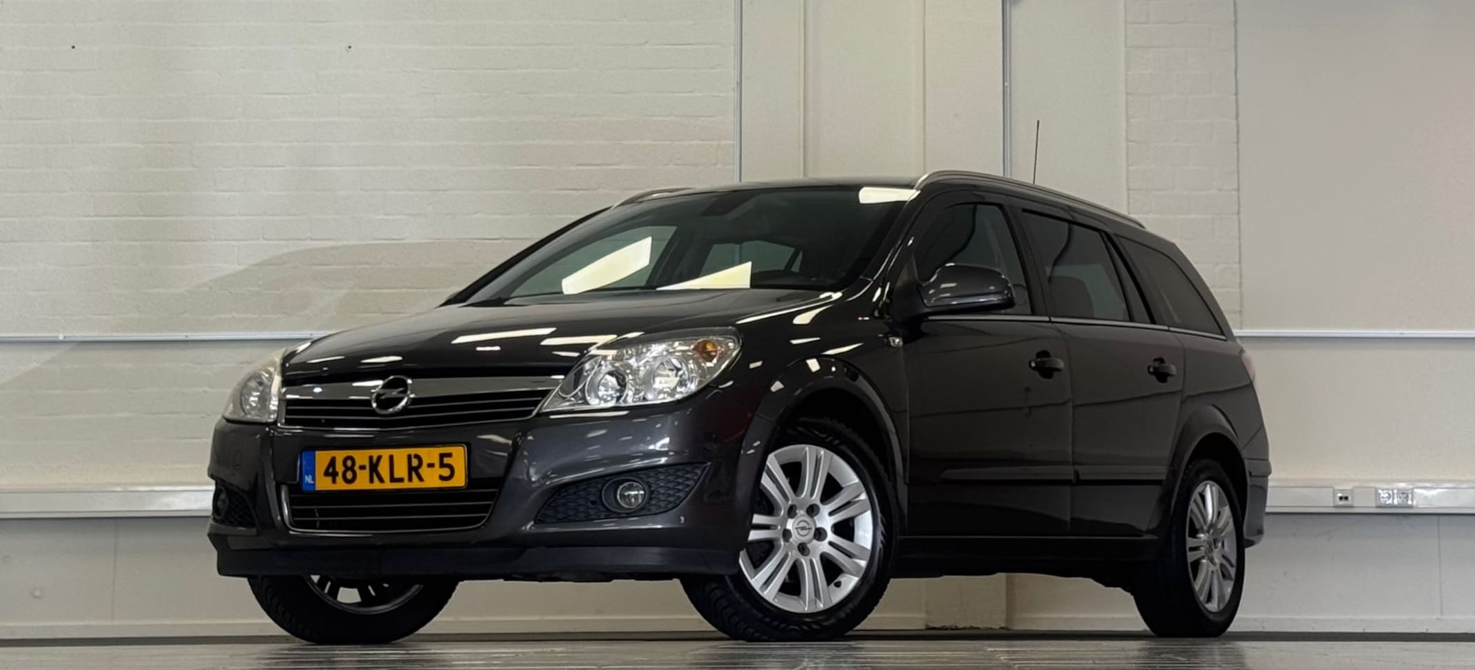 Opel Astra Wagon - 1.6i 16V Cosmo Lerenbekledig Trekhaak PDC 4e Eigenaar - AutoWereld.nl